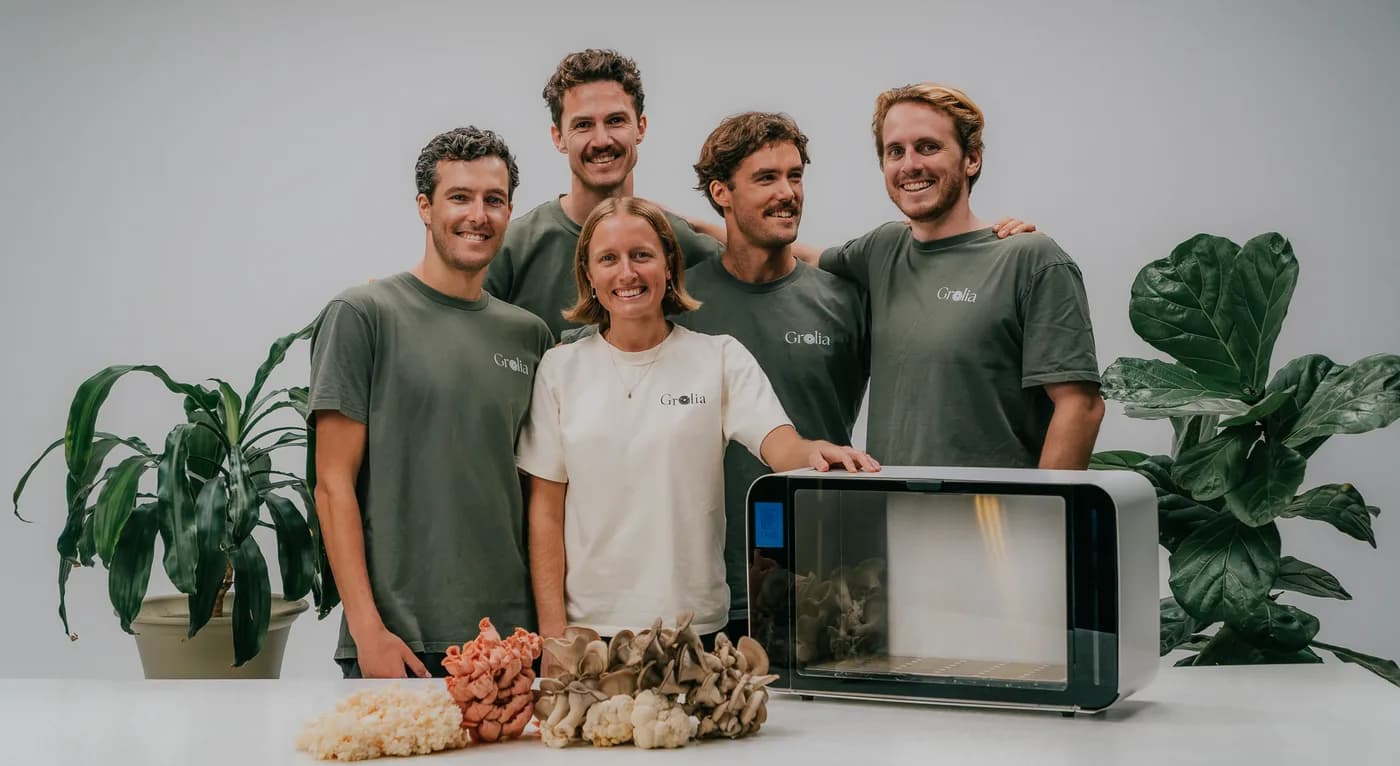 The five-person Grolia team together with the Flush cabinet